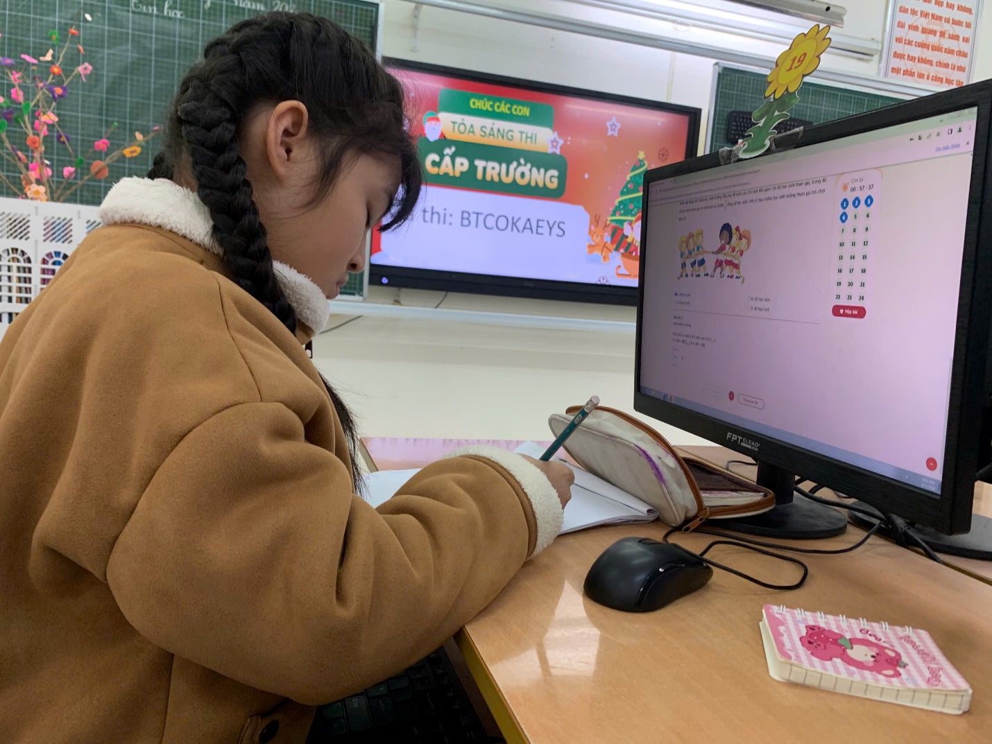 A child sitting at a desk writing on a paper

AI-generated content may be incorrect.