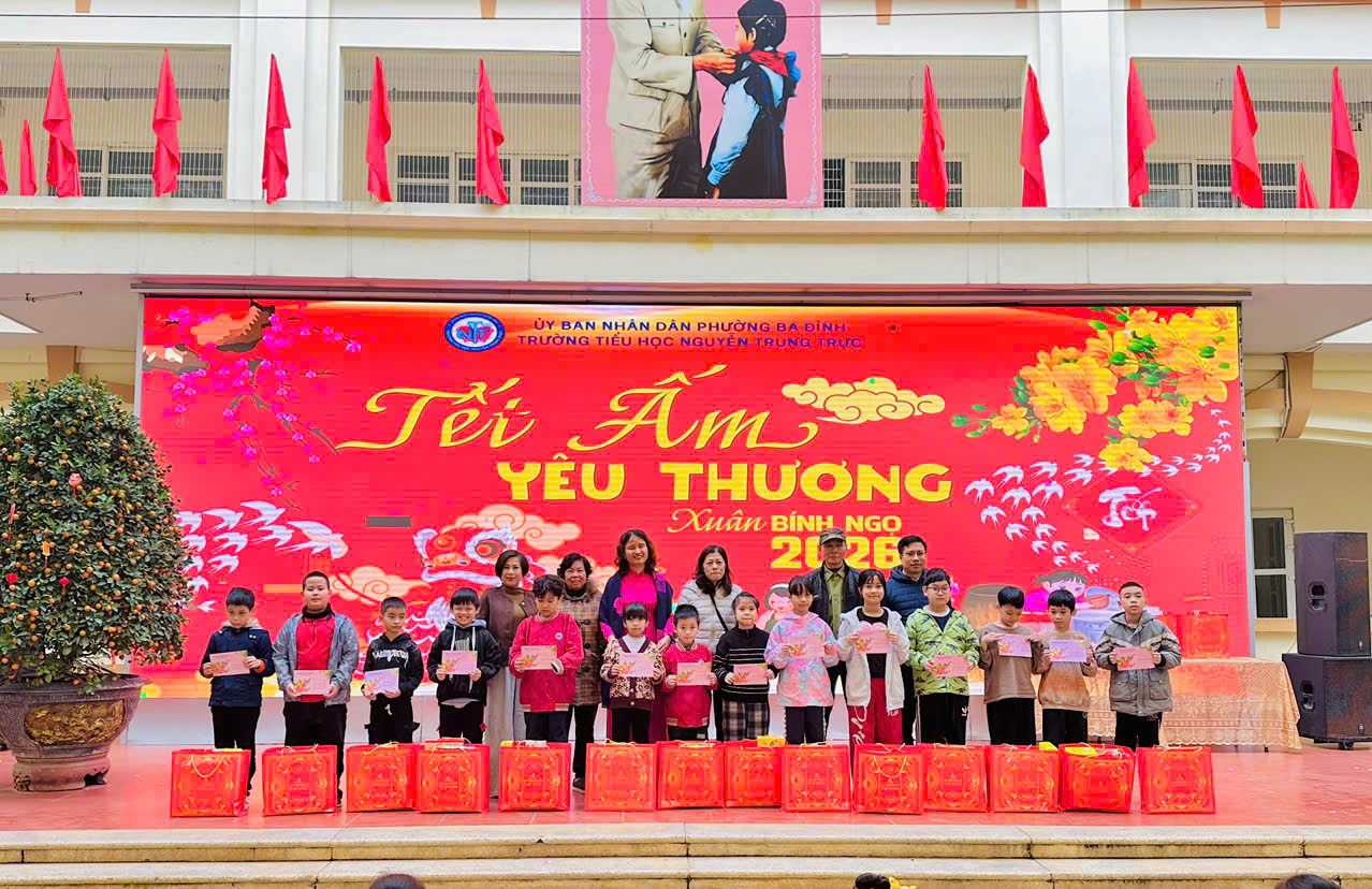 A group of people standing on steps in front of a banner

AI-generated content may be incorrect.