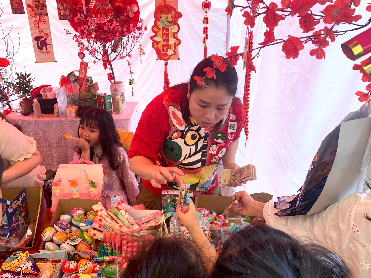 A person and two children at a table

AI-generated content may be incorrect.