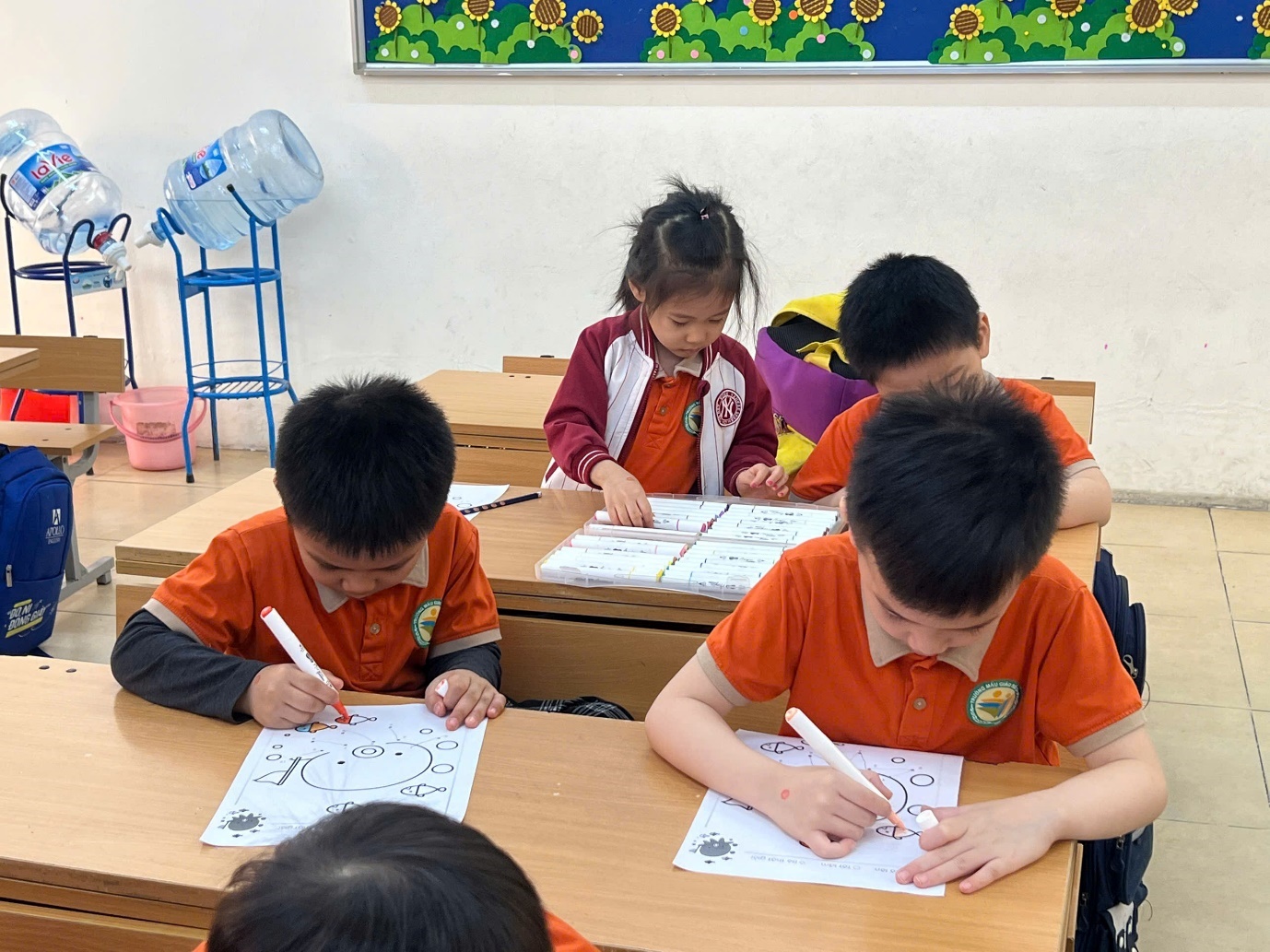 A group of children sitting at desks writing on paper

AI-generated content may be incorrect.