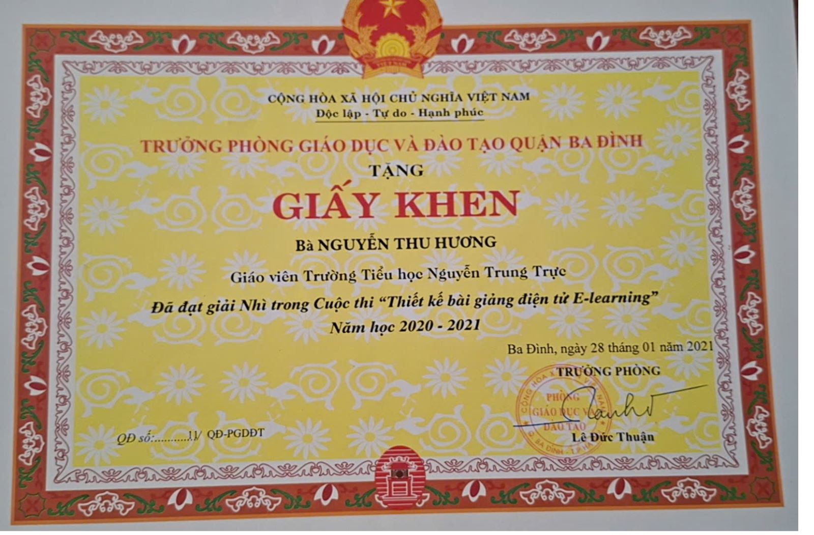 A yellow certificate with red and white textAI-generated content may be incorrect.